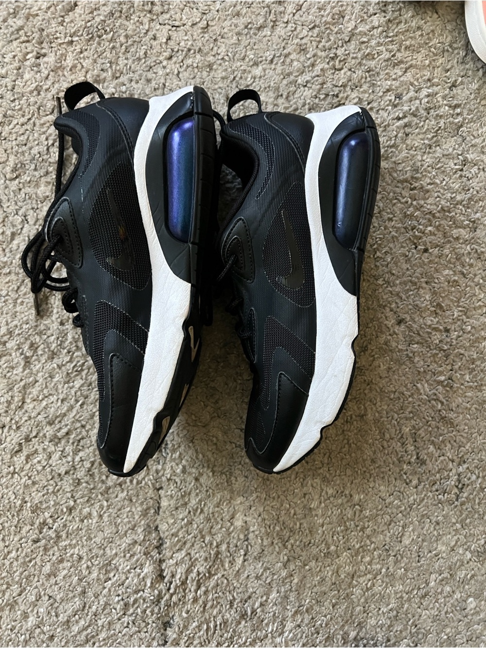 Women’s black Athletic NIKE Sneakers with White Midsole
